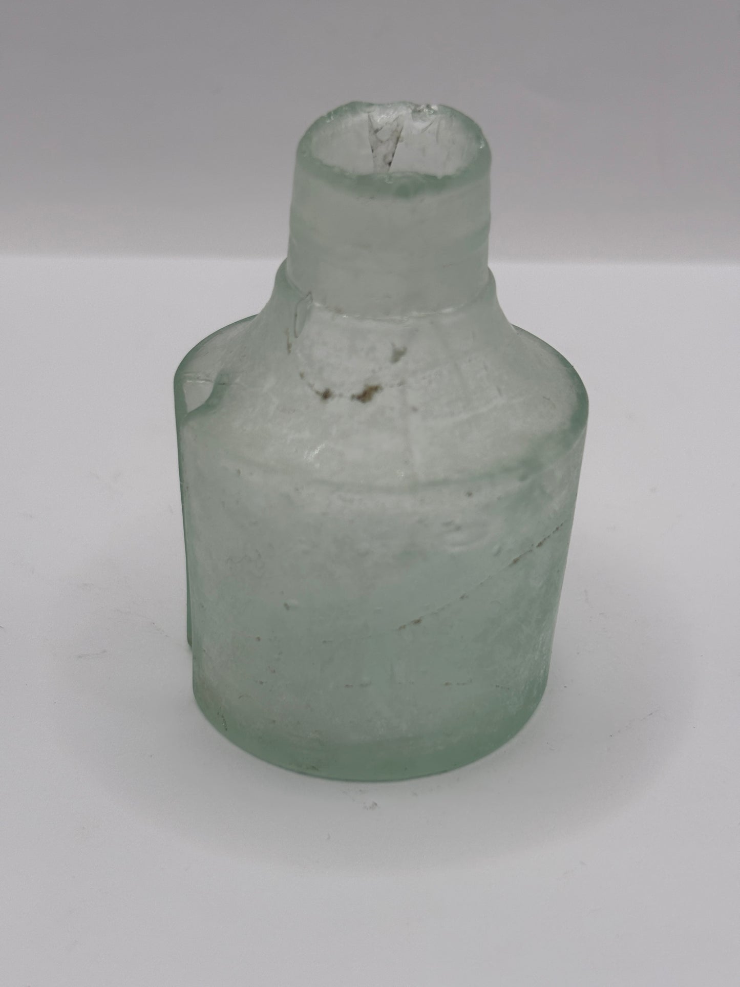 Old aqua glass inkwell, ink bottle with pen rest