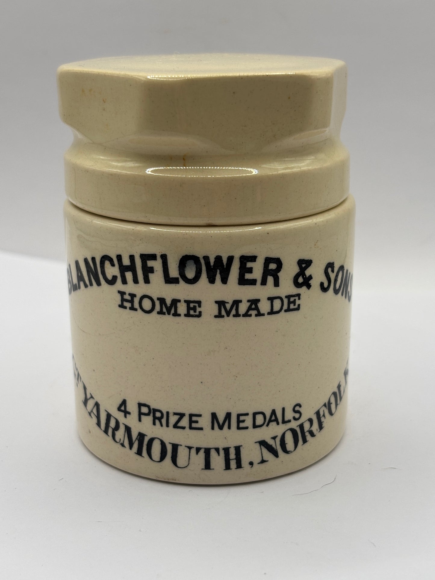 Old stoneware potted meat jar and lid. Blanchflower. Chipped