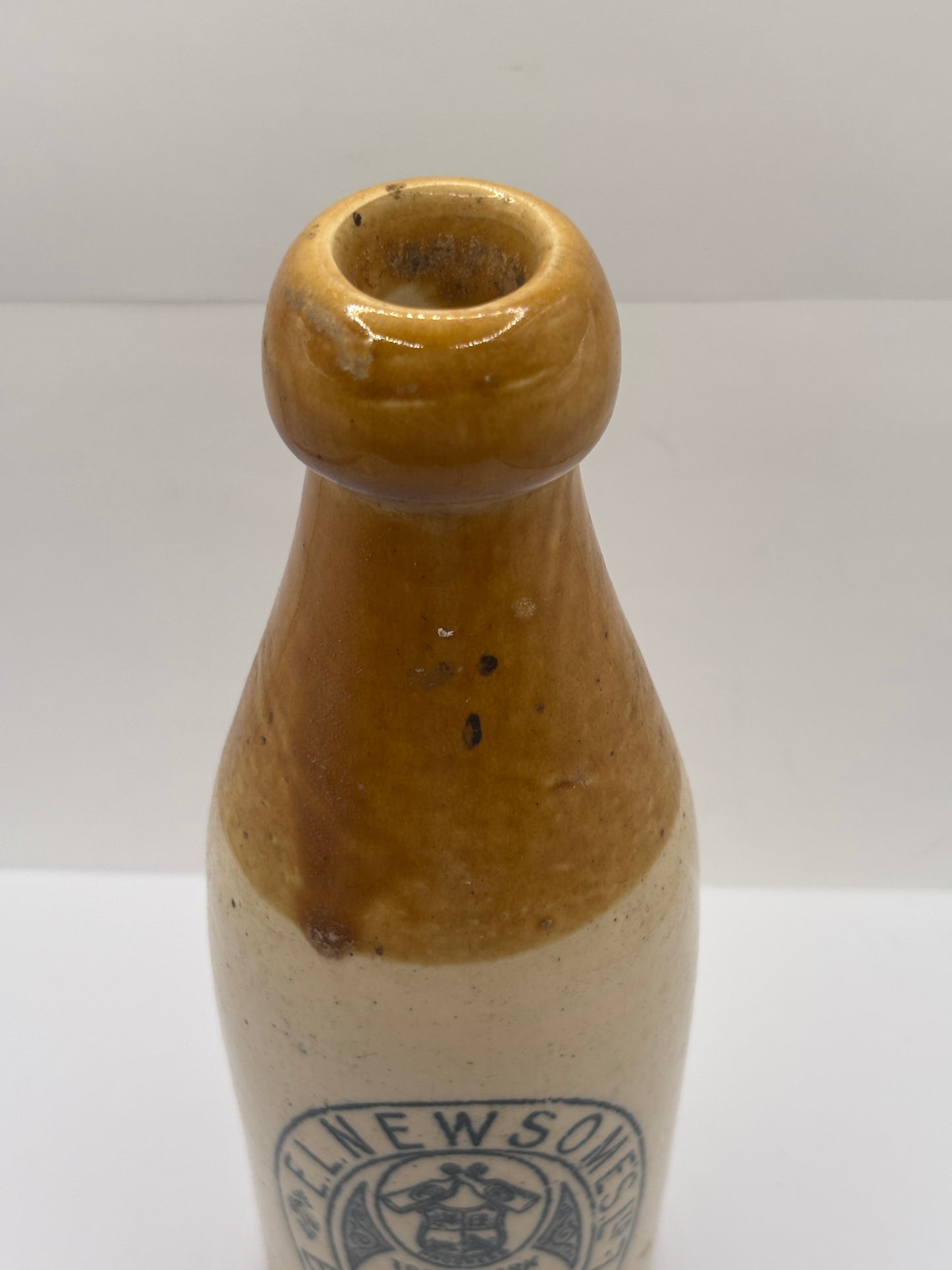 Old stoneware ginger beer bottle, EL Newsomes Blackpool