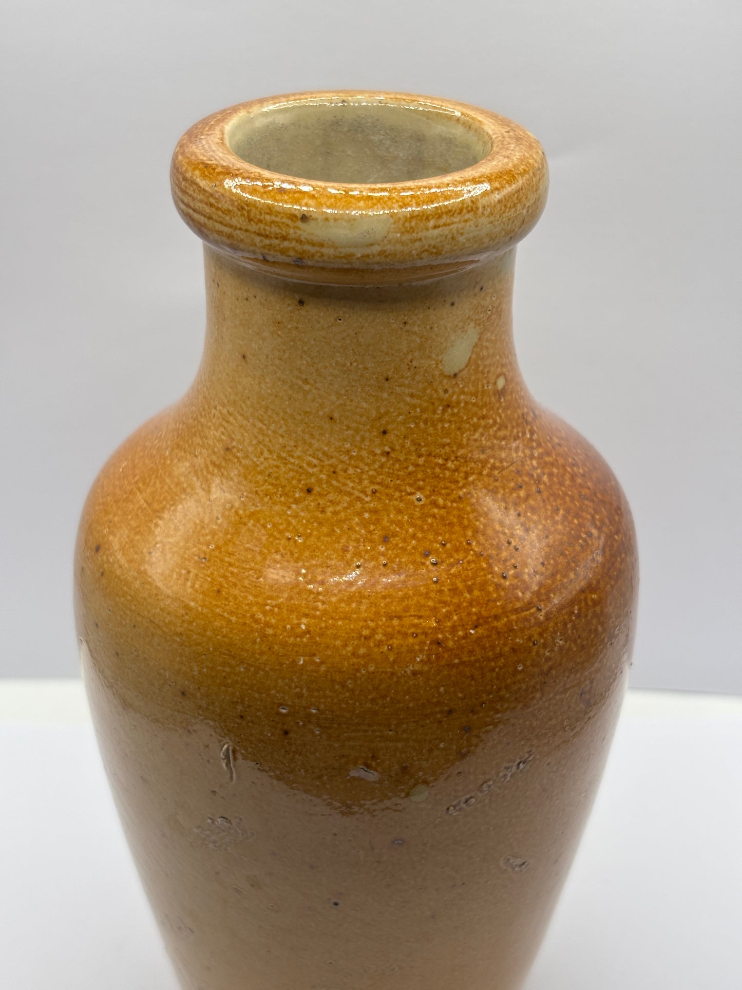 Old brown stoneware jar/vase