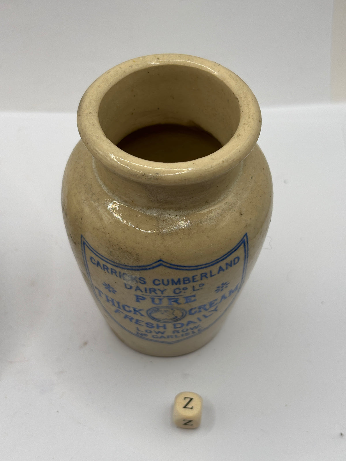 Old advertising cream pot, Carricks Cumberland dairy (z)