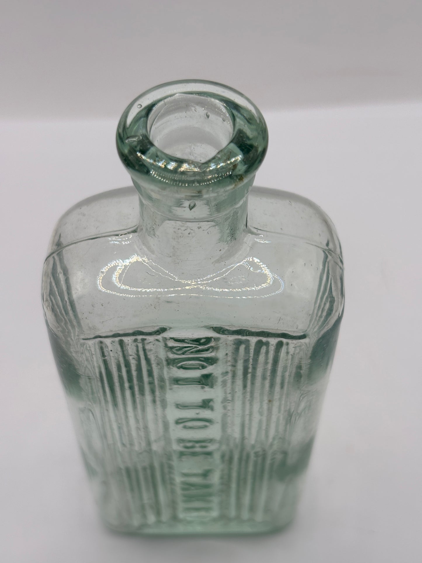 Old aqua glass poison bottle, not to be taken (Copy)