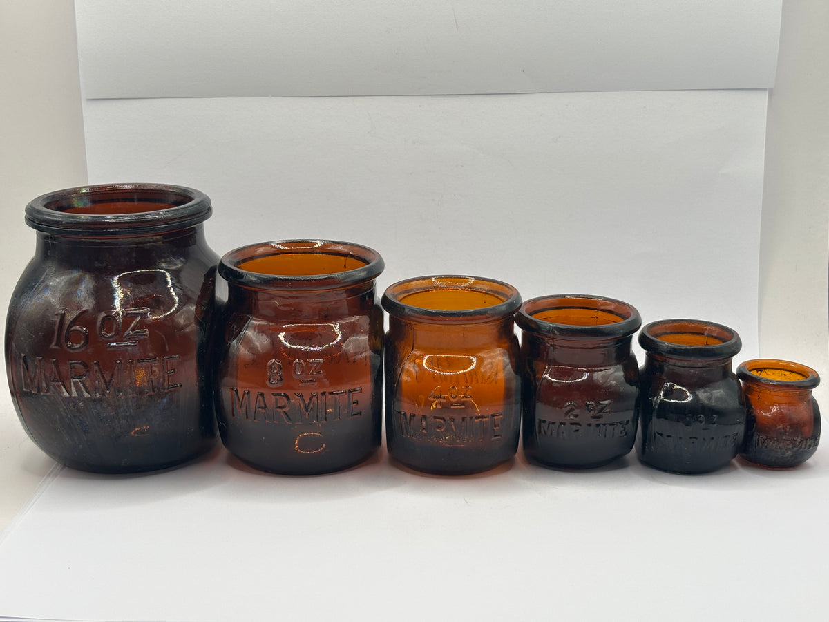 Full Set of 6 old amber glass Marmite bottles. 16oz- 0.5oz