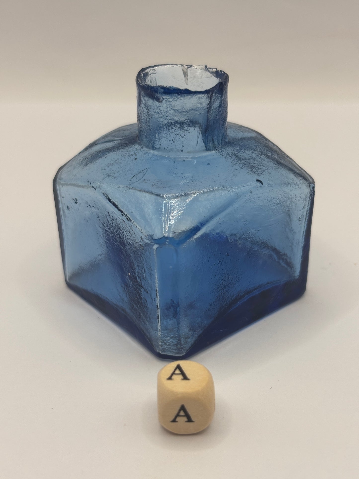 Old blue glass ink bottle, inkwell, penny ink (a) crusty