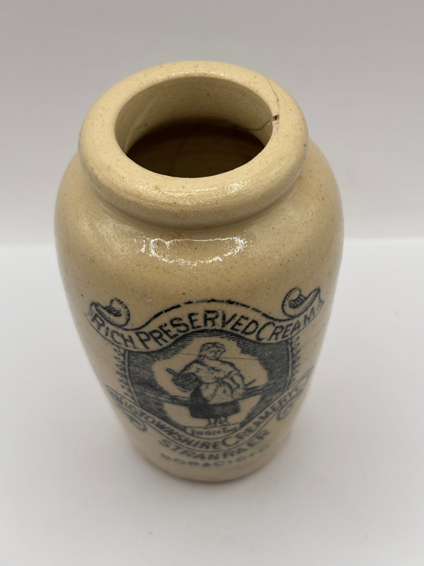 Old advertising cream pot, Rich preserved cream, Stranraer. Milk maid. damaged