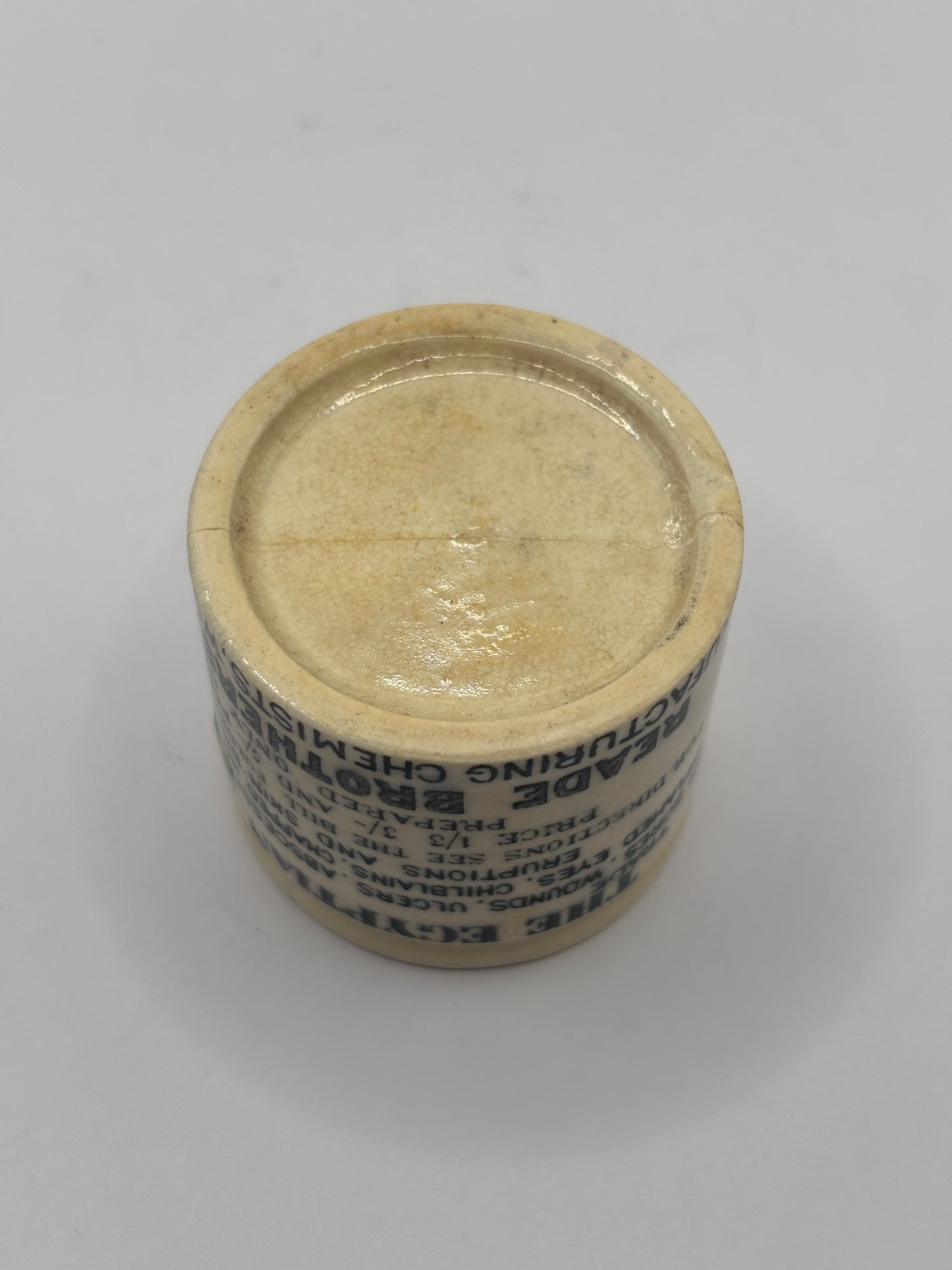 Old advertising ointment pot, The Egyptian salve. Damaged
