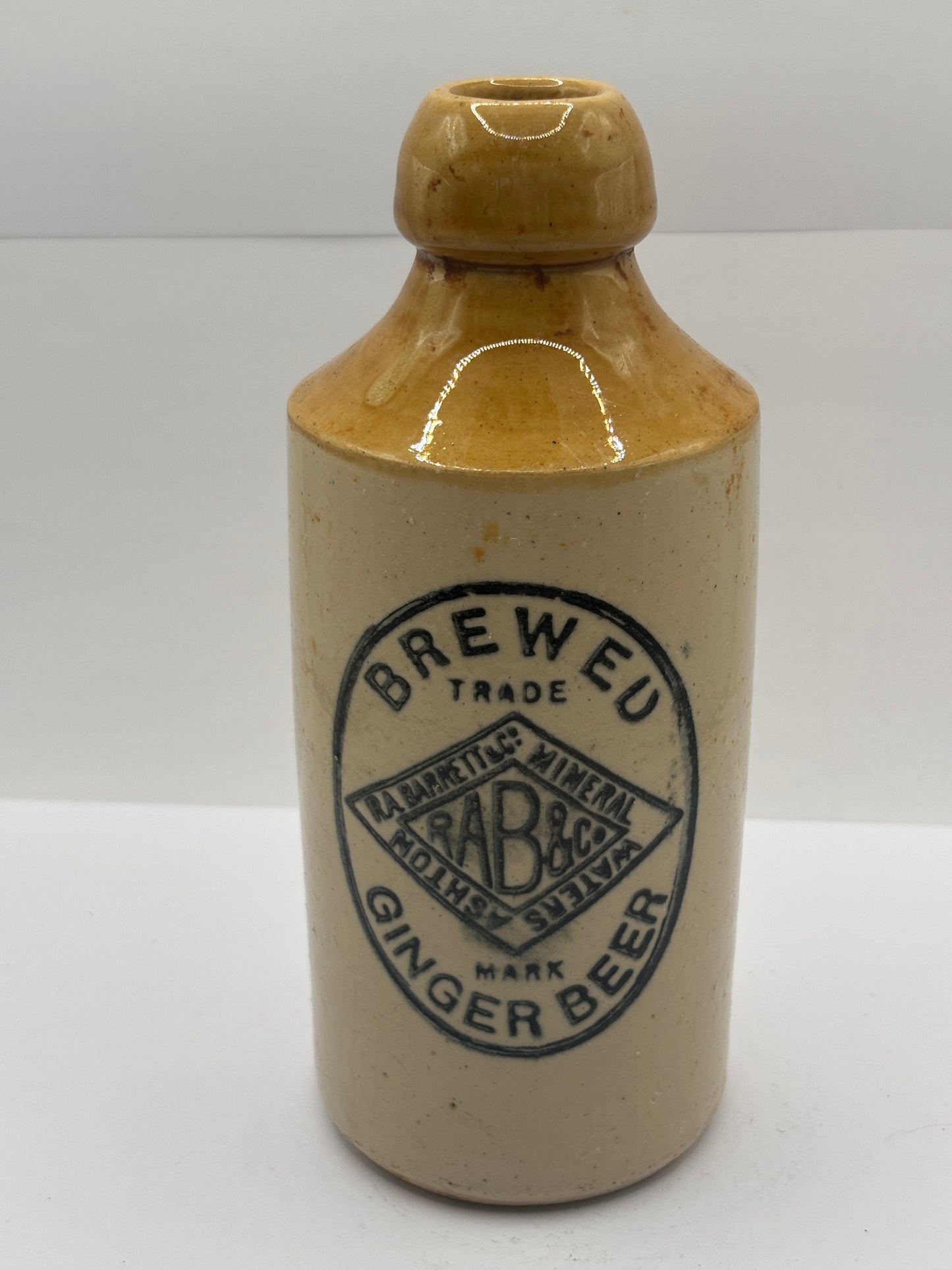 Old stoneware ginger beer bottle, Barrett & Co mineral waters