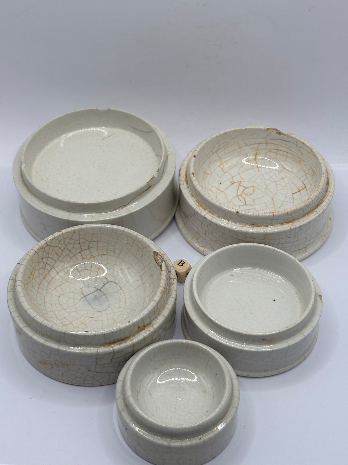 5 old stoneware pot lid bases, stackers (B)