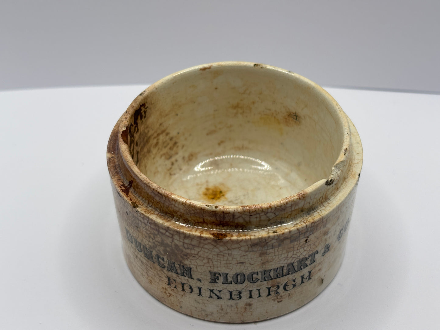 Old large Duncan Flockhart advertising chemist base, stained & crazed