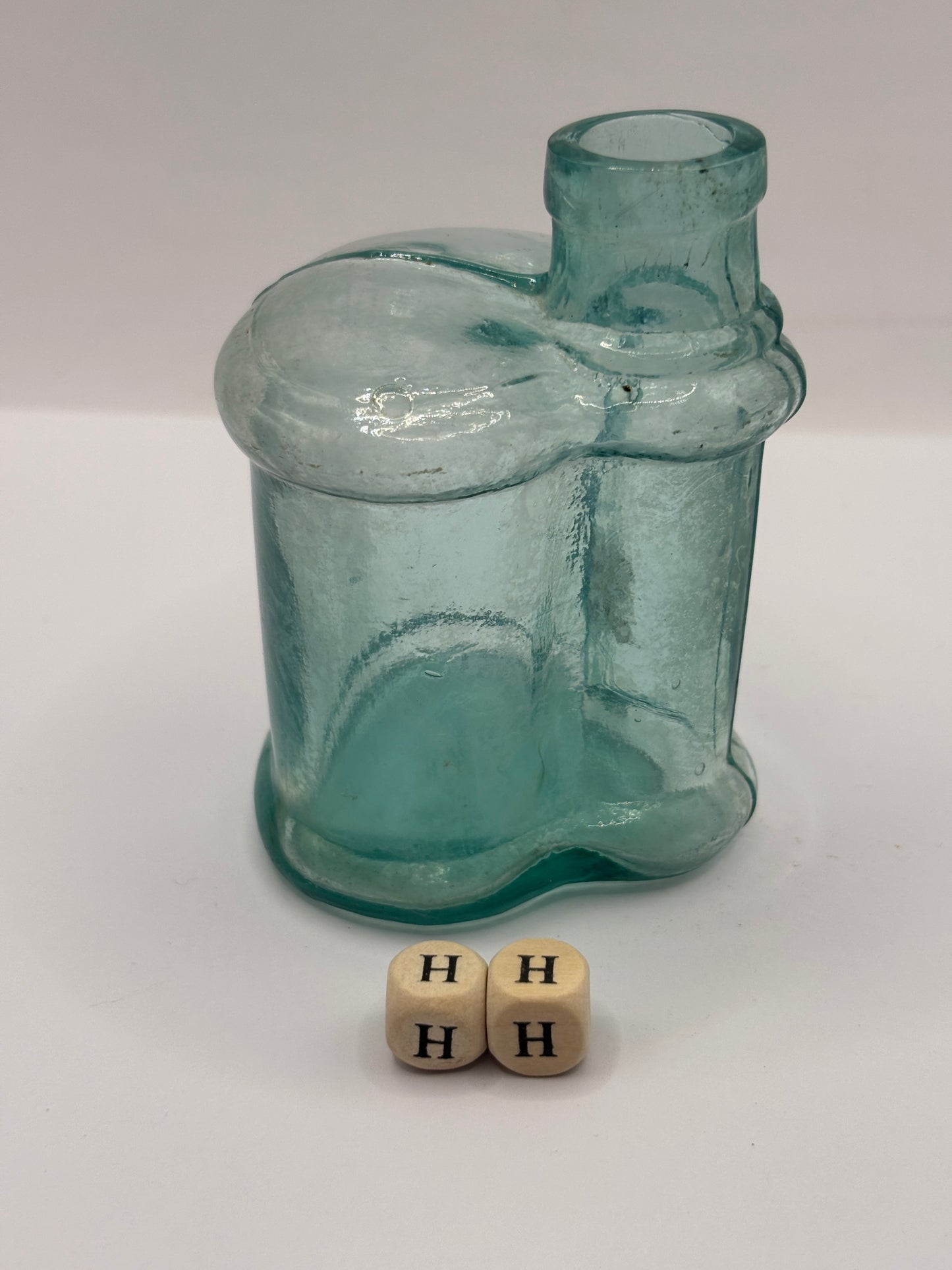 Old aqua glass inkwell (HH)