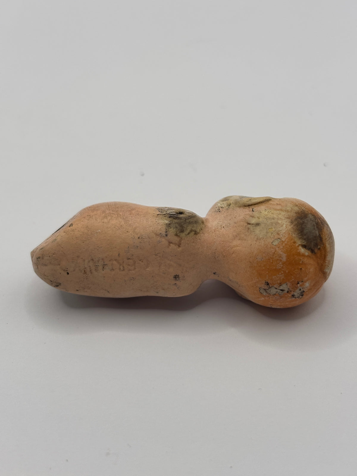 Old crusty small doll, armless & legless