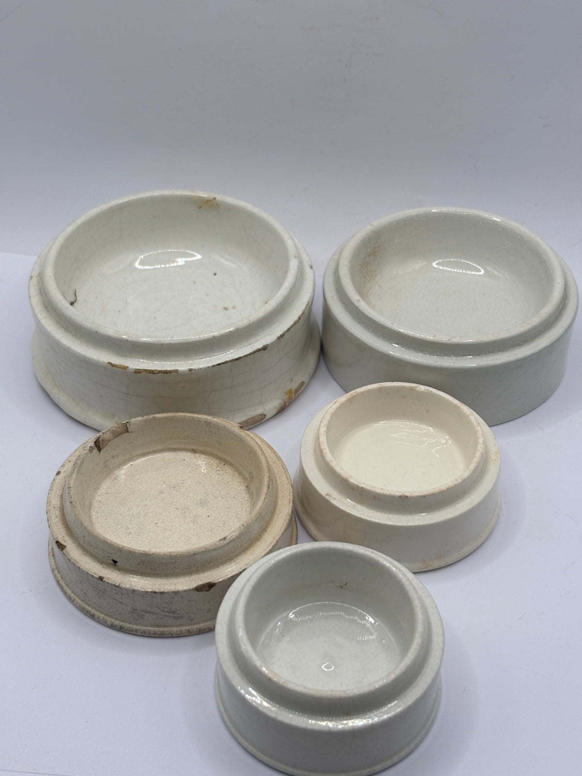 5 old stoneware pot lid bases, stackers (k)
