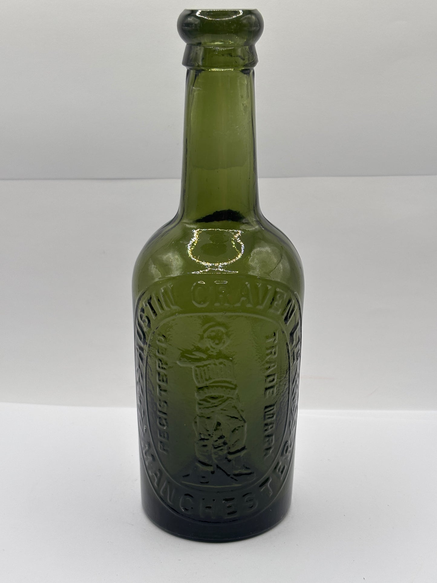 Old advertising green glass beer bottle, Austin Craven Manchester