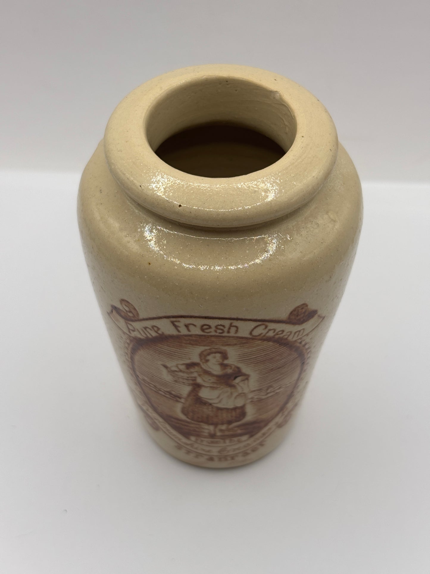 Old stoneware advertising cream pot, pure fresh cream Stranraer. Serpia print