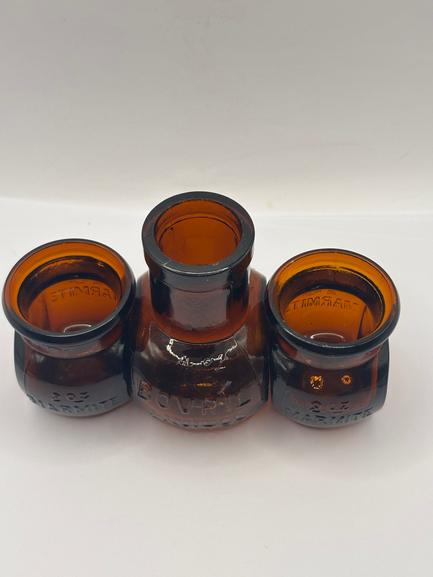3 old amber glass bottles, marmite & bovril