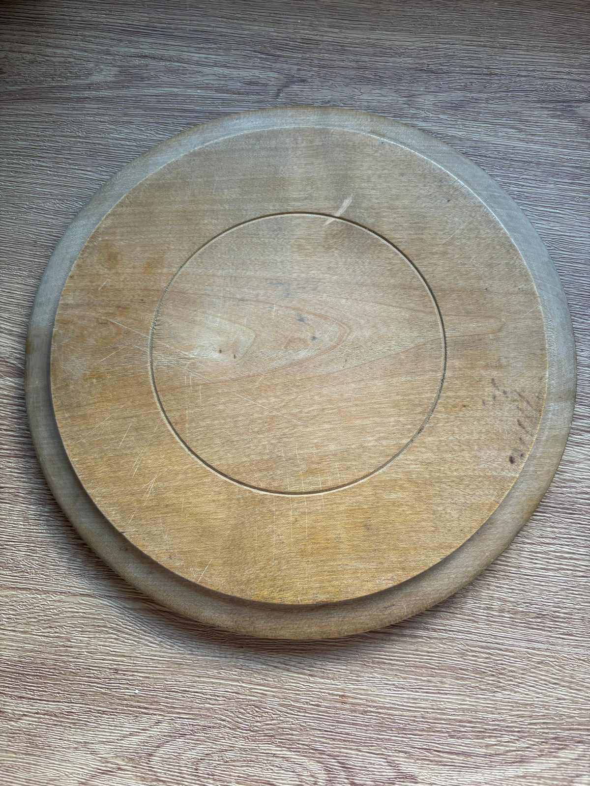 Old wooden carved bread board