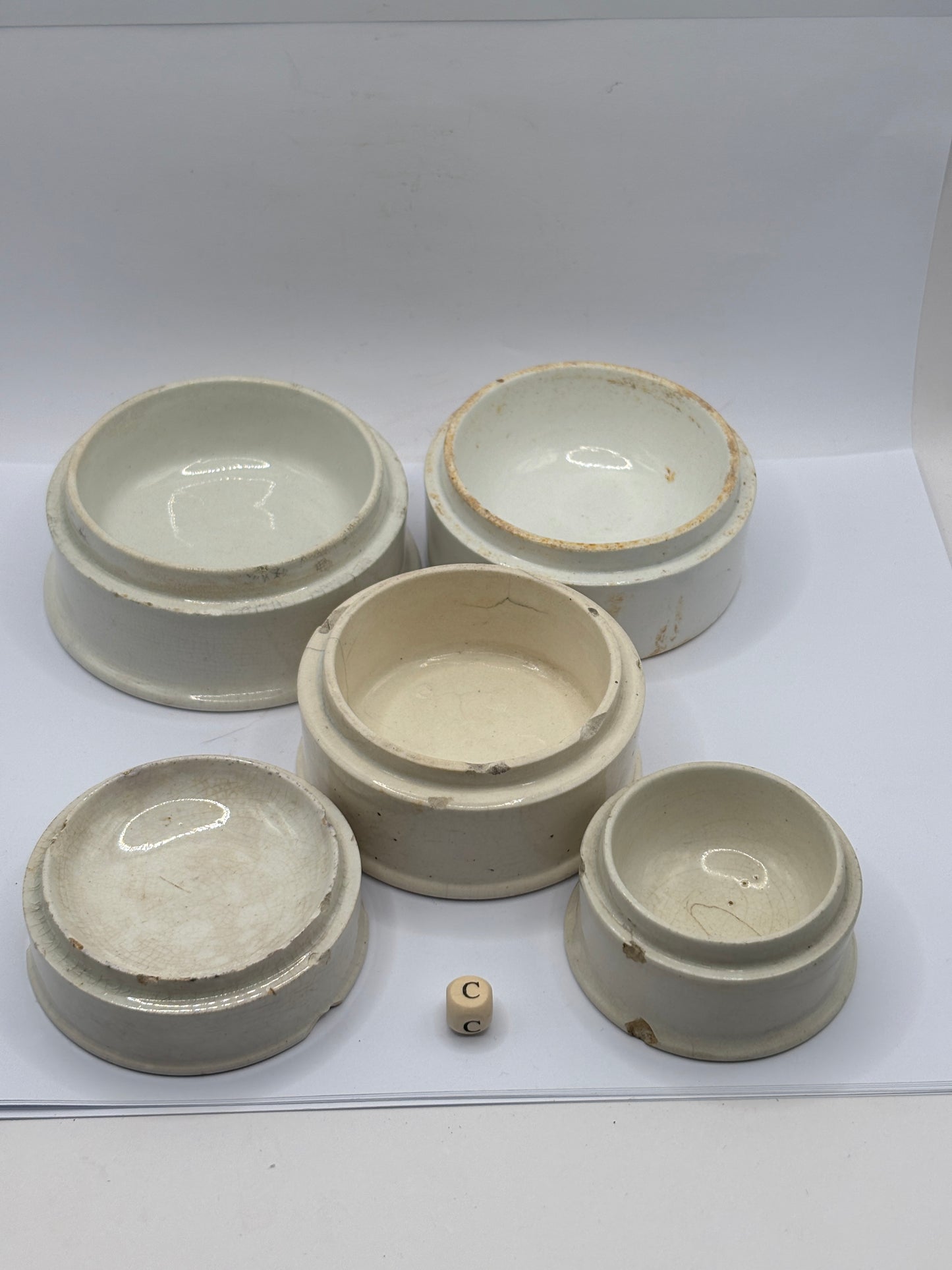 5 old stoneware bases, stackers (c) damages
