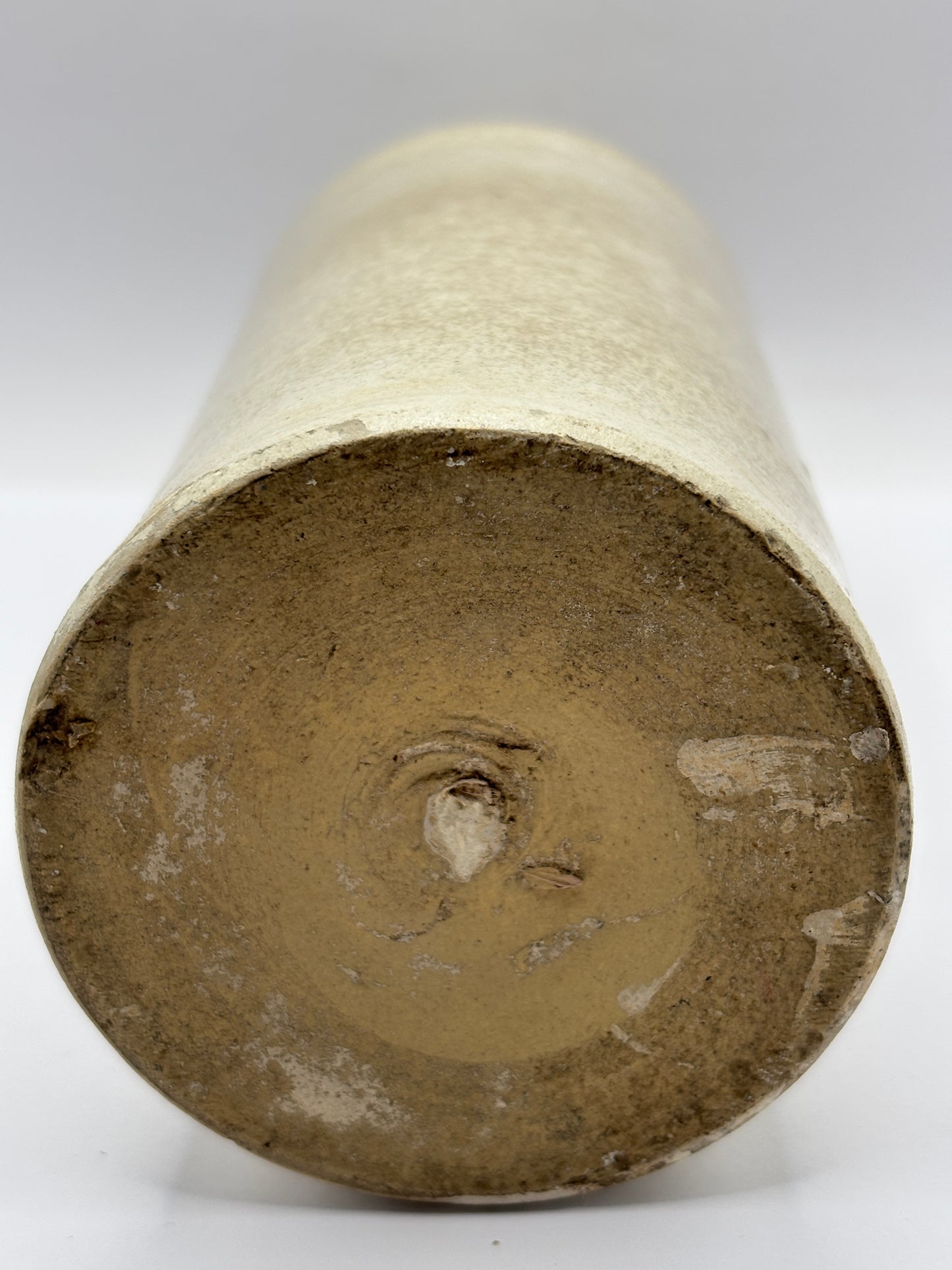 Old tall white stoneware porter bottle