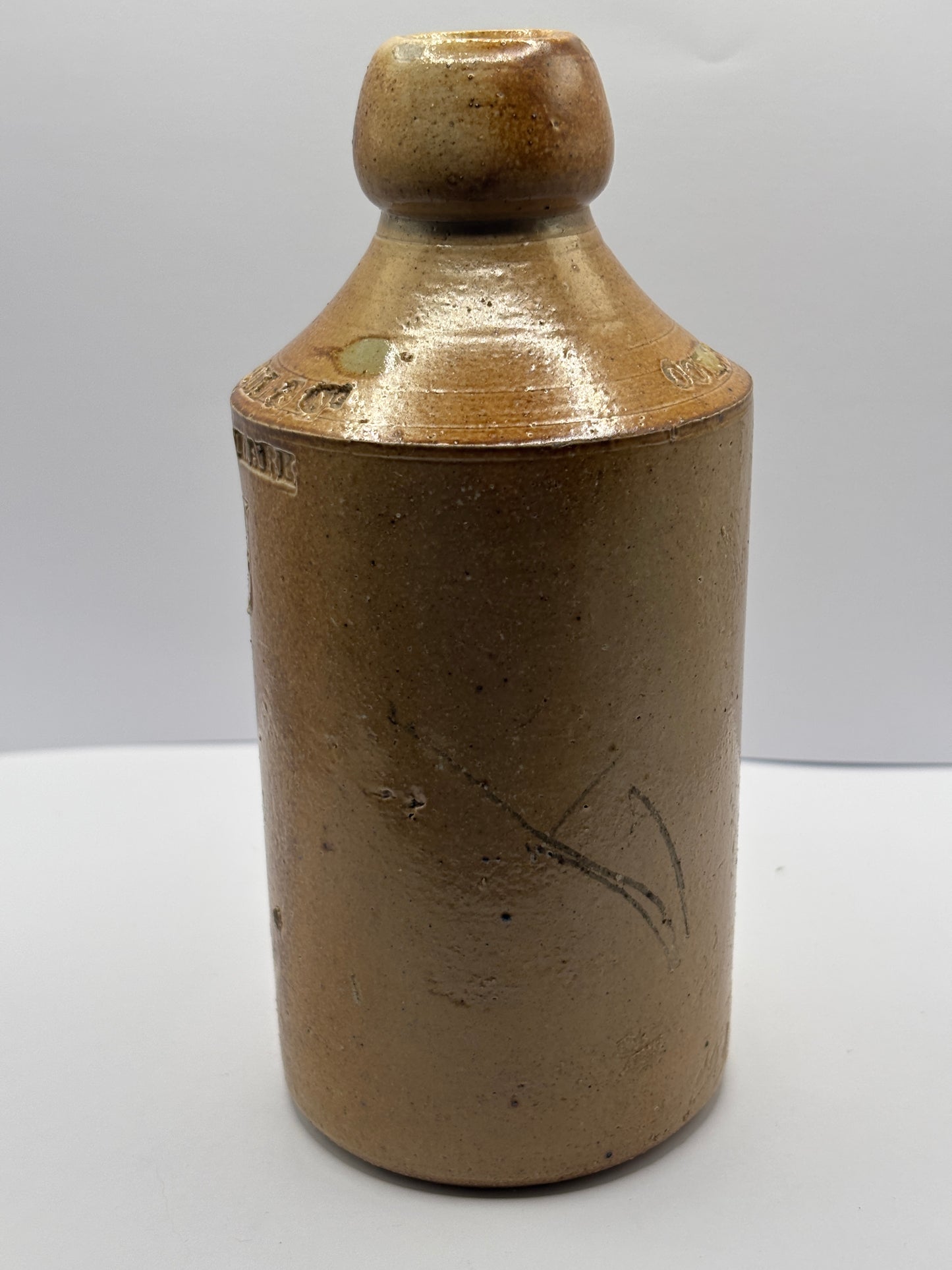 Old Colchester impressed ginger beer bottle, Nicholl & co