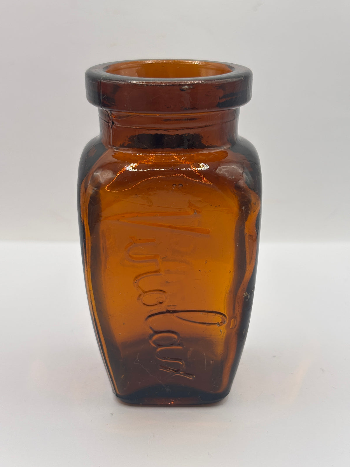 Old amber glass Virolax jar