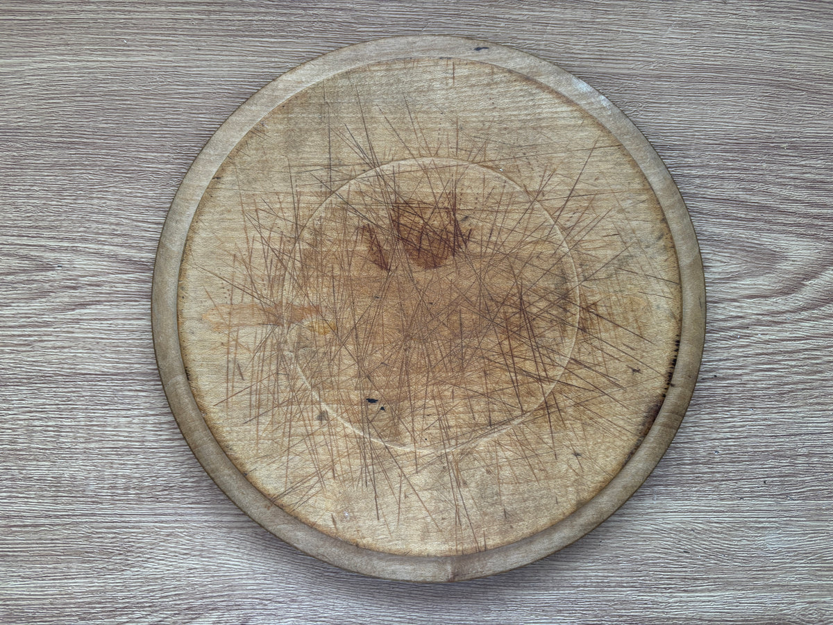 Old wooden carved bread board