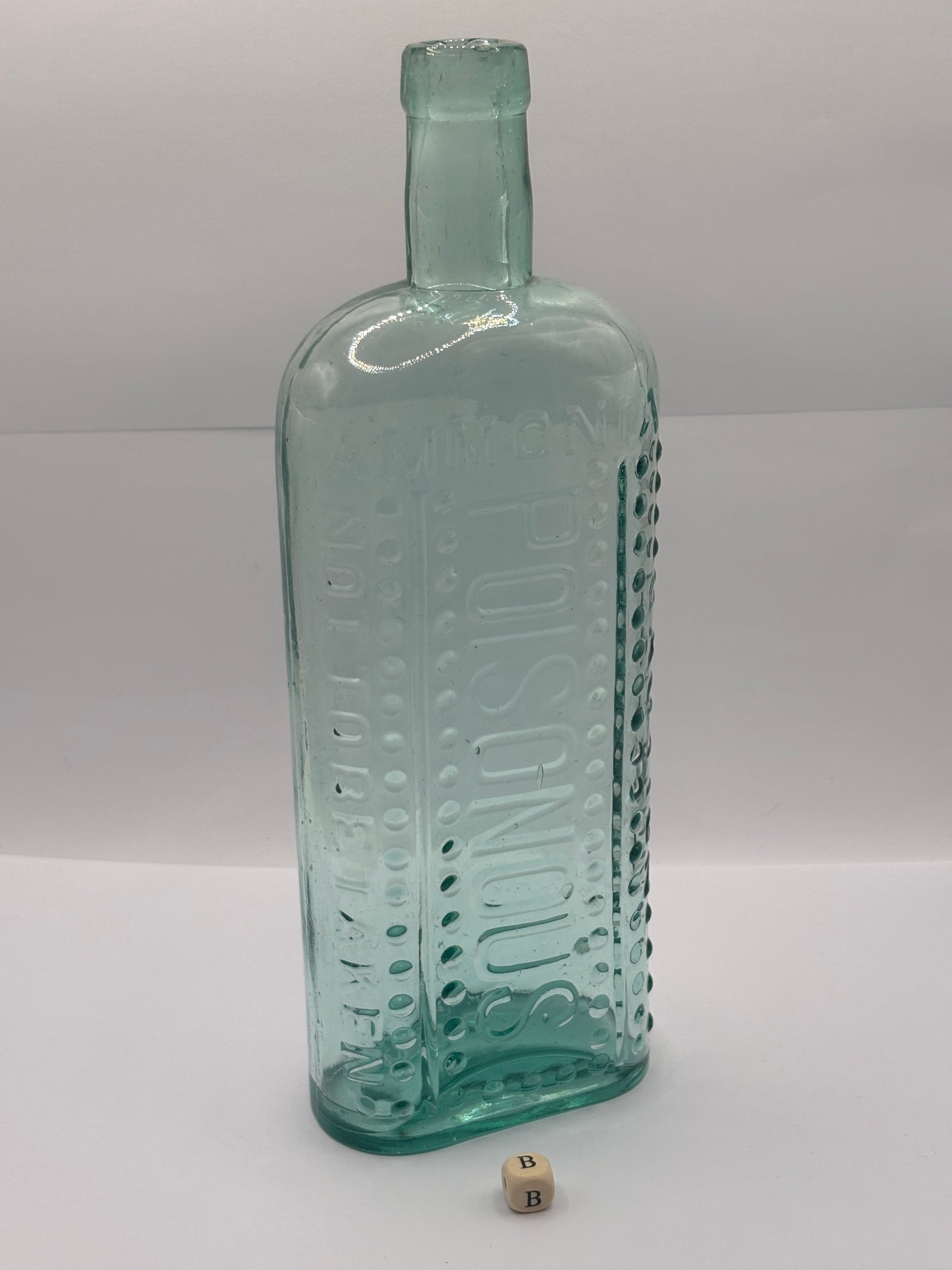 Old large aqua glass poison bottle, Poisonous (B) ammonia