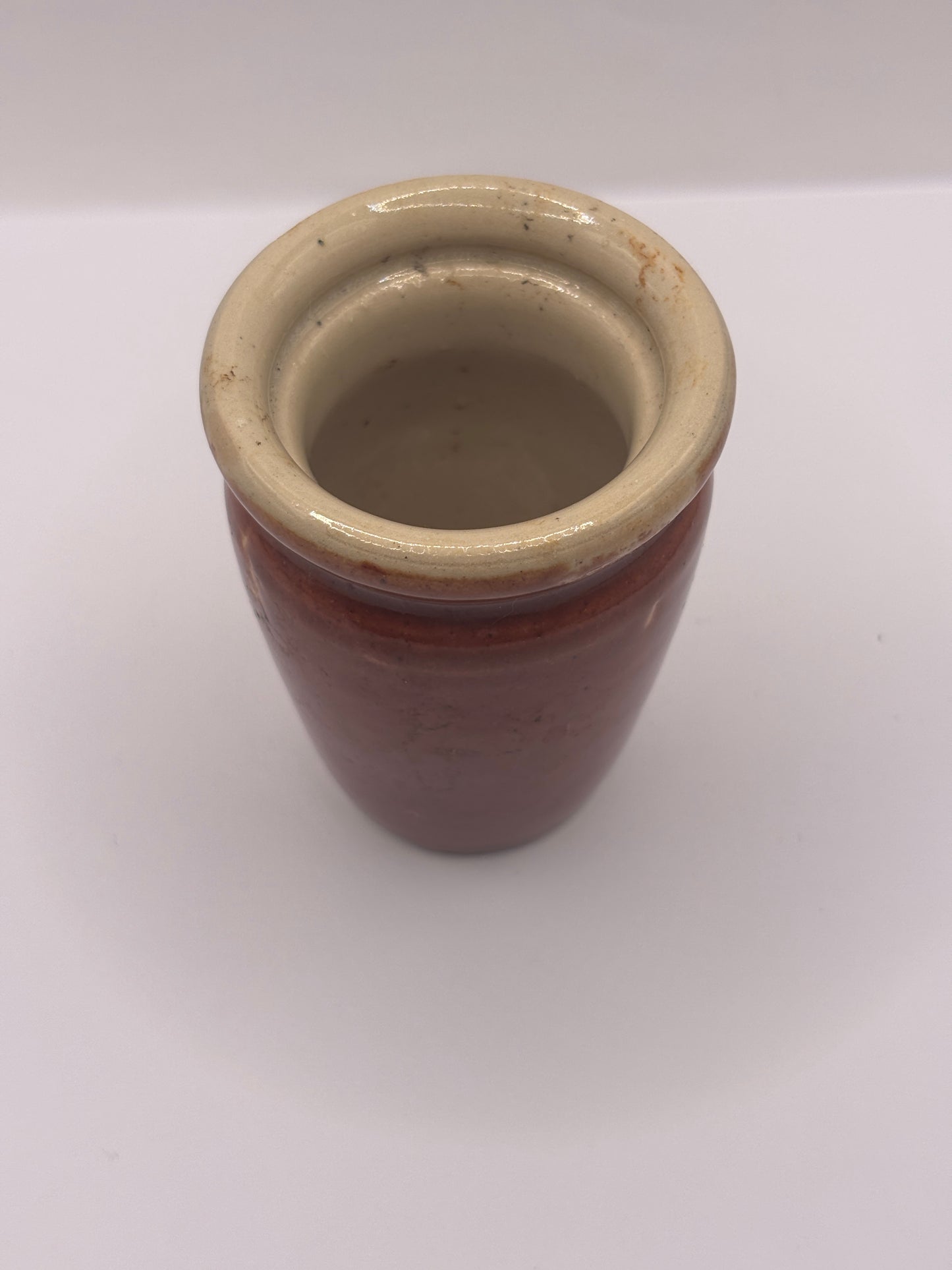 Old small brown stoneware cream pot