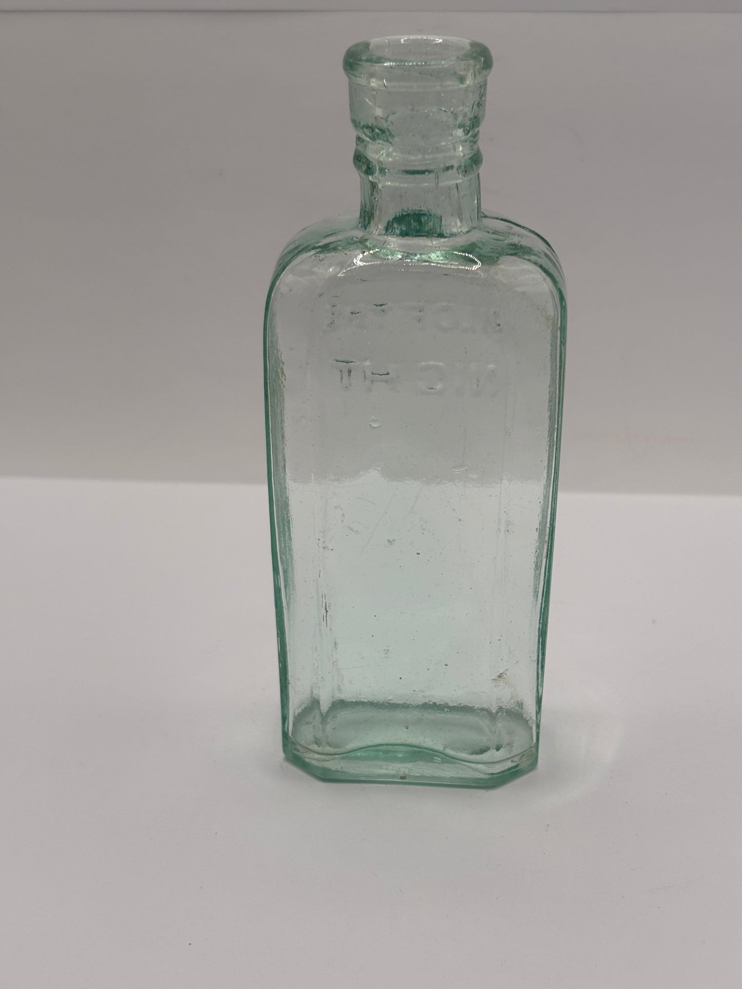 Old glass advertising chemist bottle, Days oil of the night