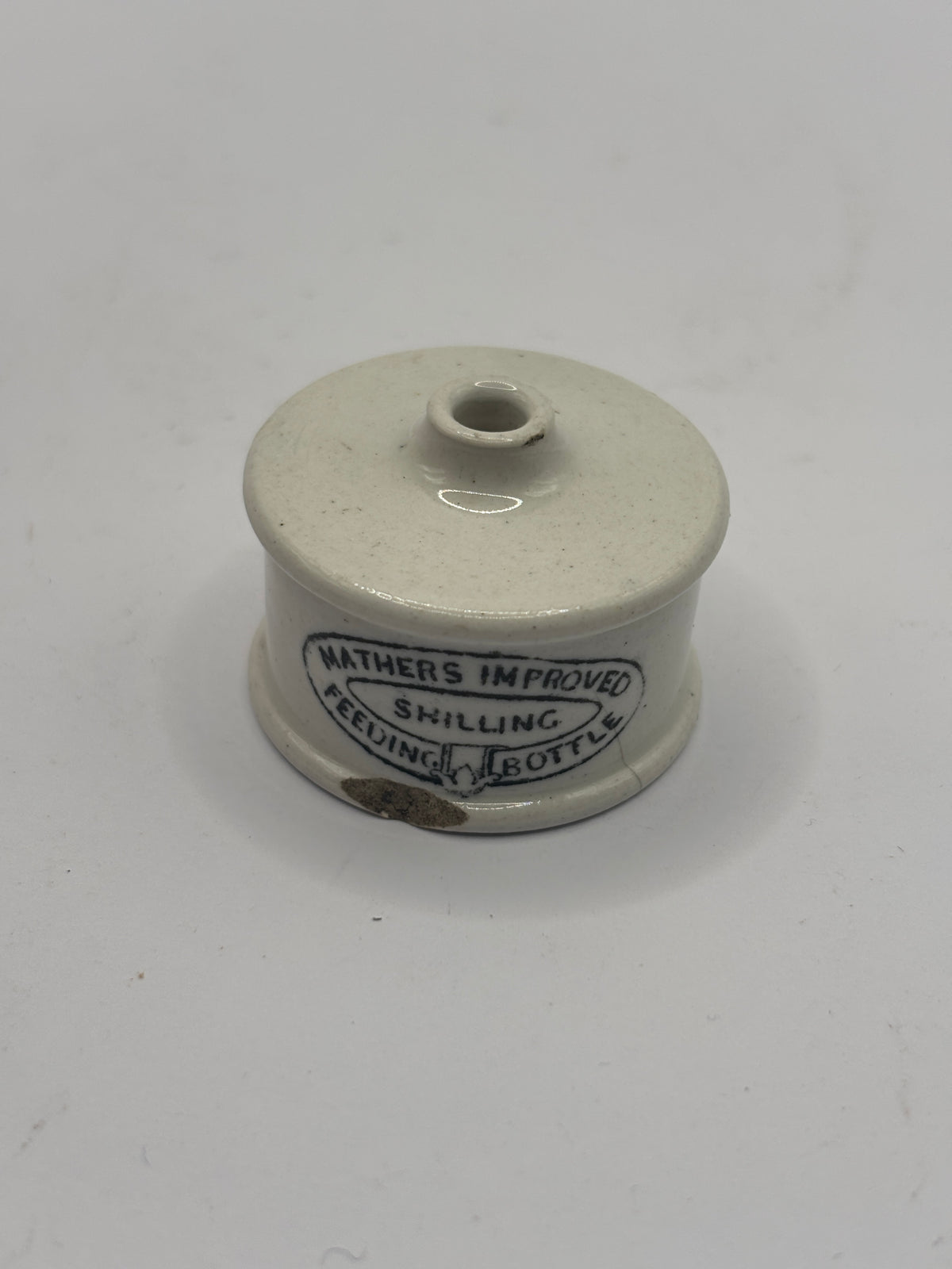 Old advertising baby feeder lid, Mathers improved feeding bottle lid