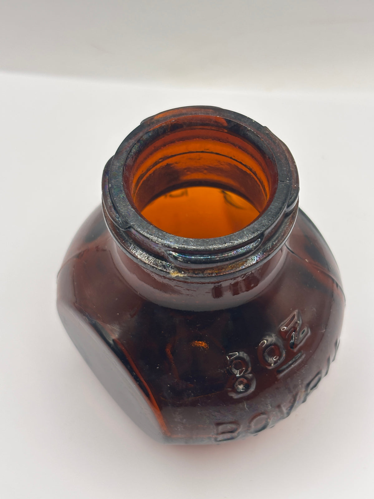 Old 8oz amber glass advertising Bovril bottle