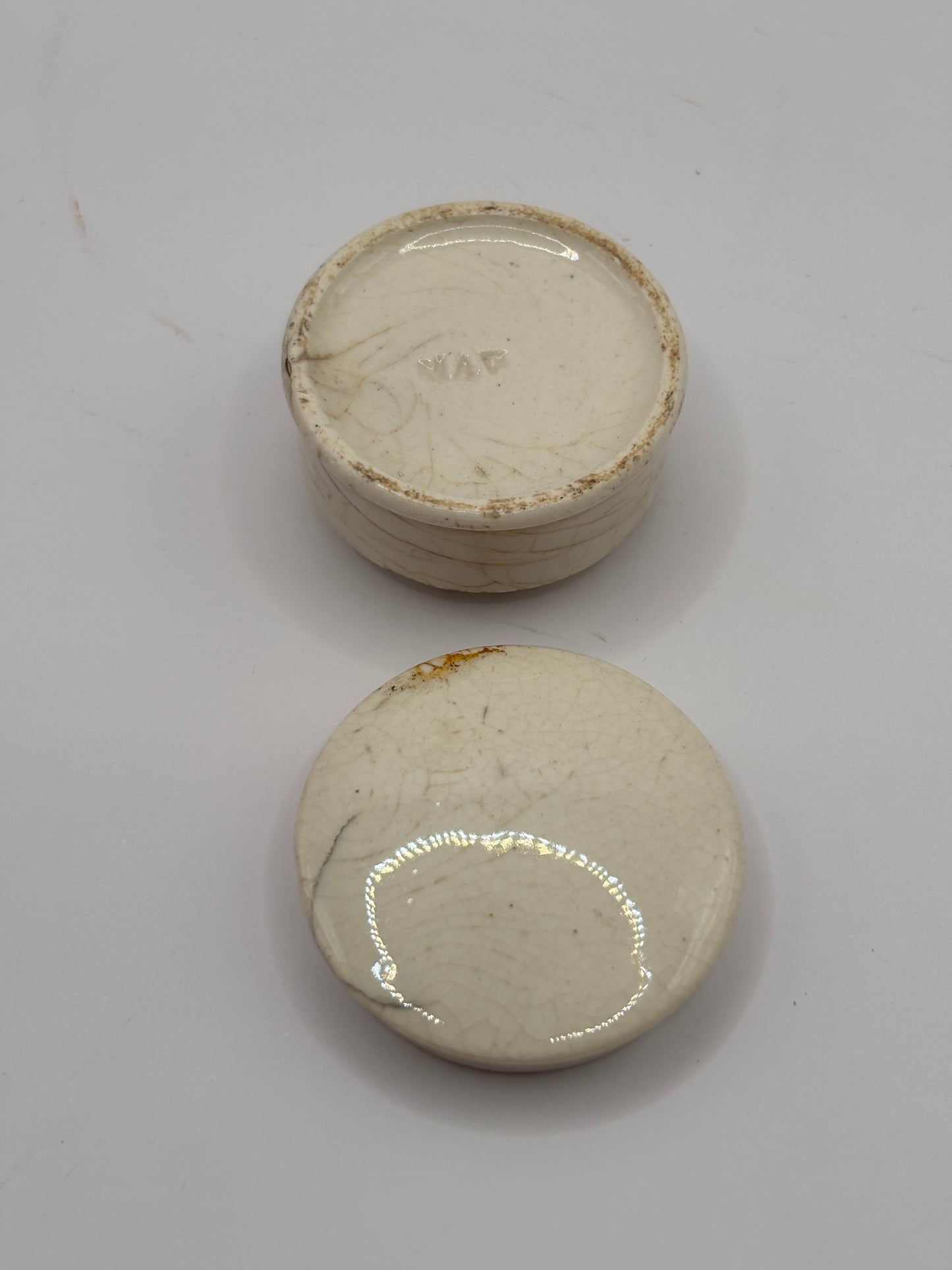 Old miniature pot lid and base