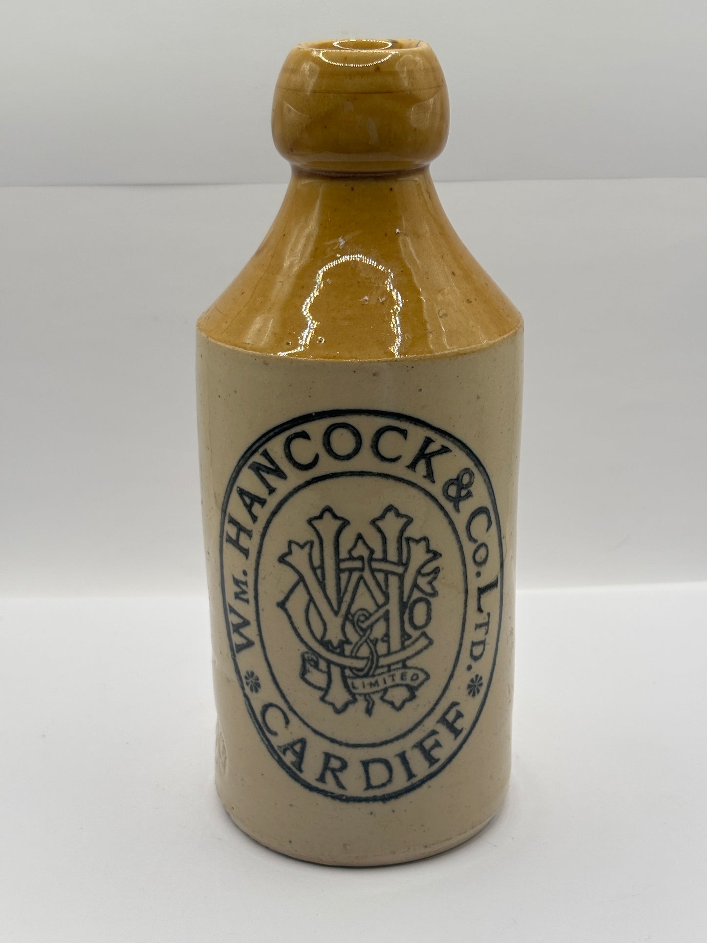 Old stoneware ginger beer bottle, Hancock & Co Cardiff