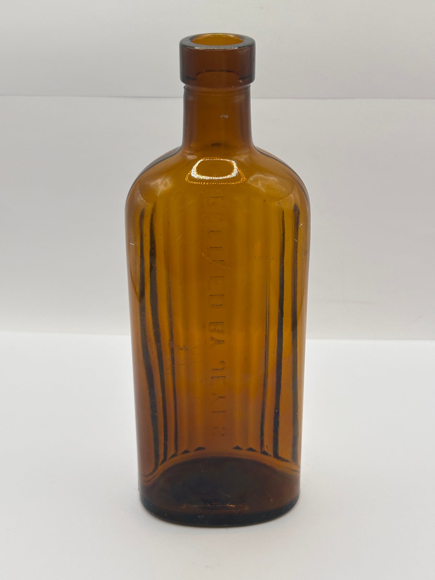Old amber glass Jeyes fluid bottle