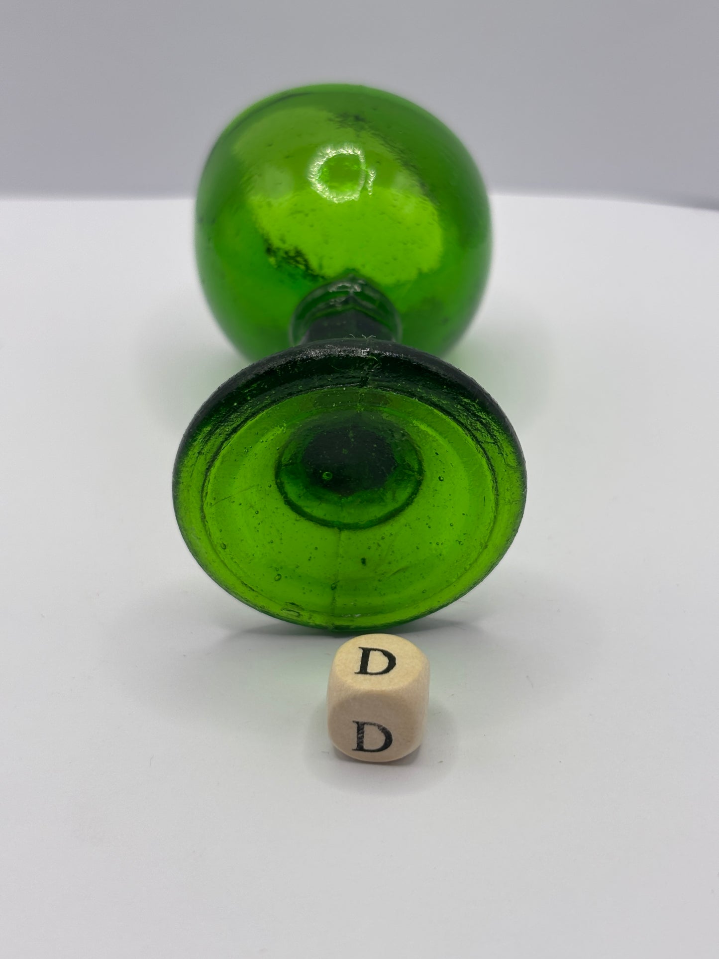 Old green glass eye bath (D)