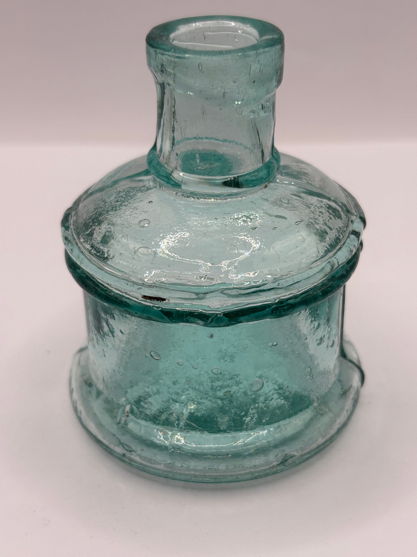 Old aqua glass advertising inkwell, ink bottle. Lyons ink