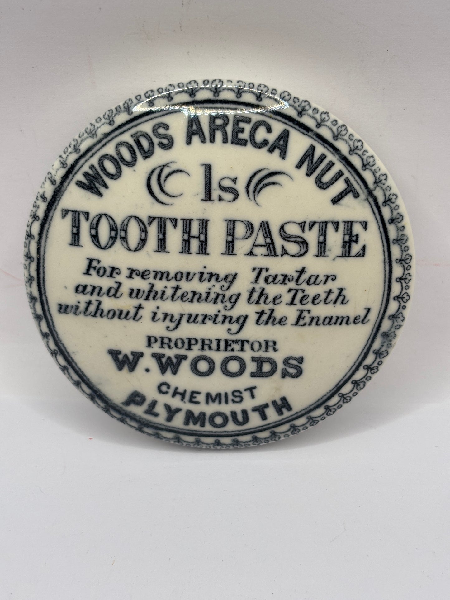 Old advertising lid, Woods areca nut tooth paste. 1S Variant