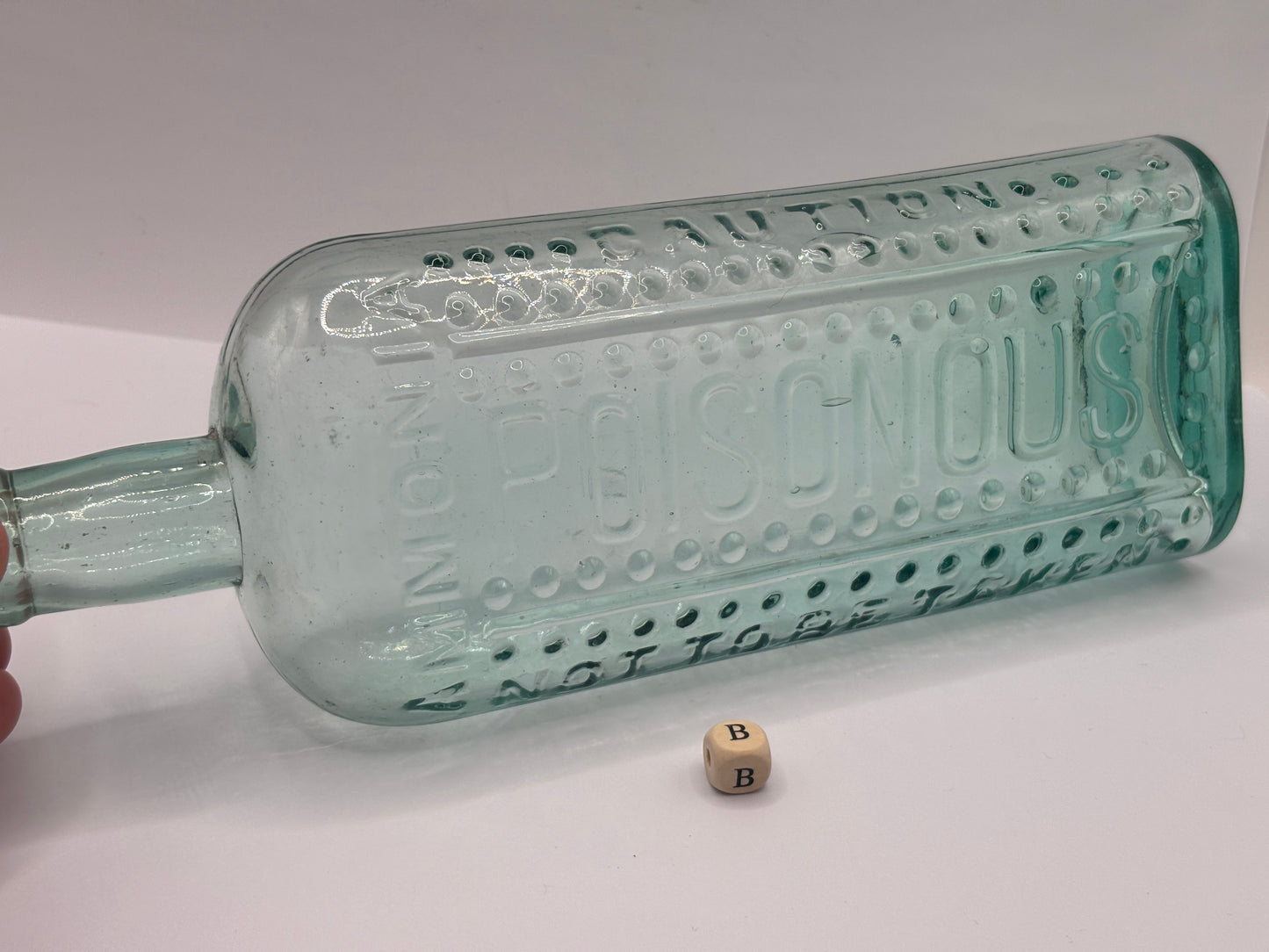 Old large aqua glass poison bottle, Poisonous (B) ammonia