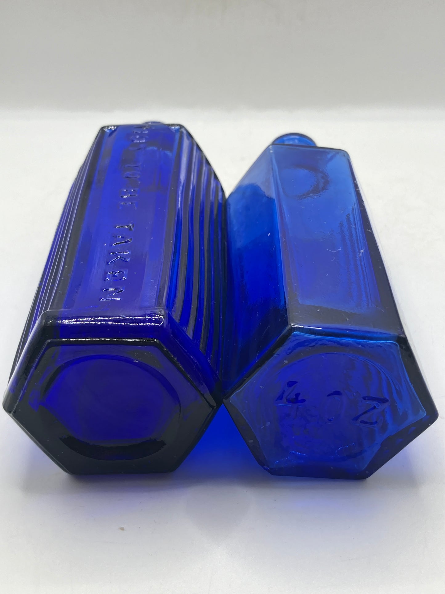 2 blue glass ribbed poison bottles, Not to be taken