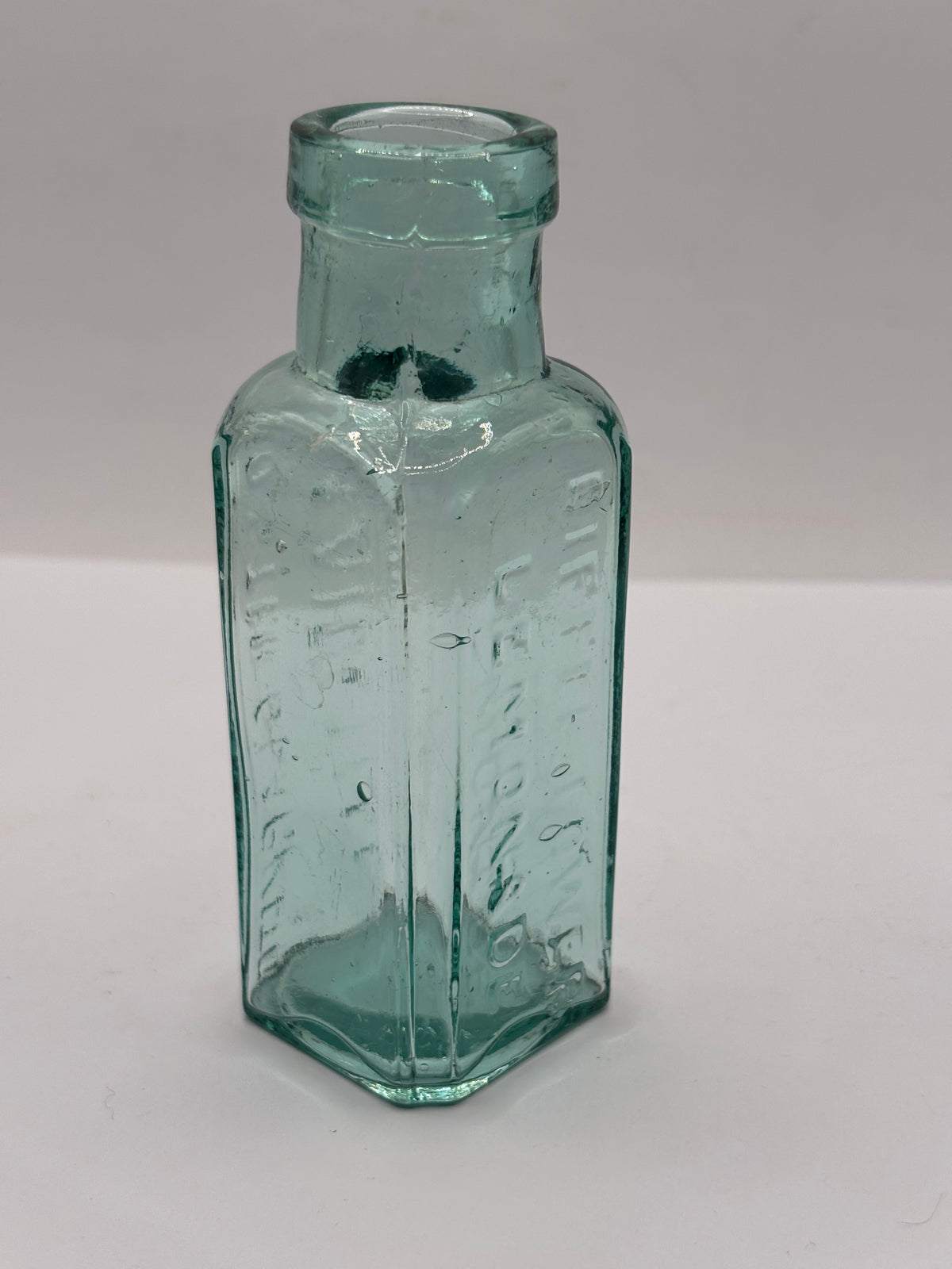Old aqua glass advertising bottle, Eiffel tower Lemonade