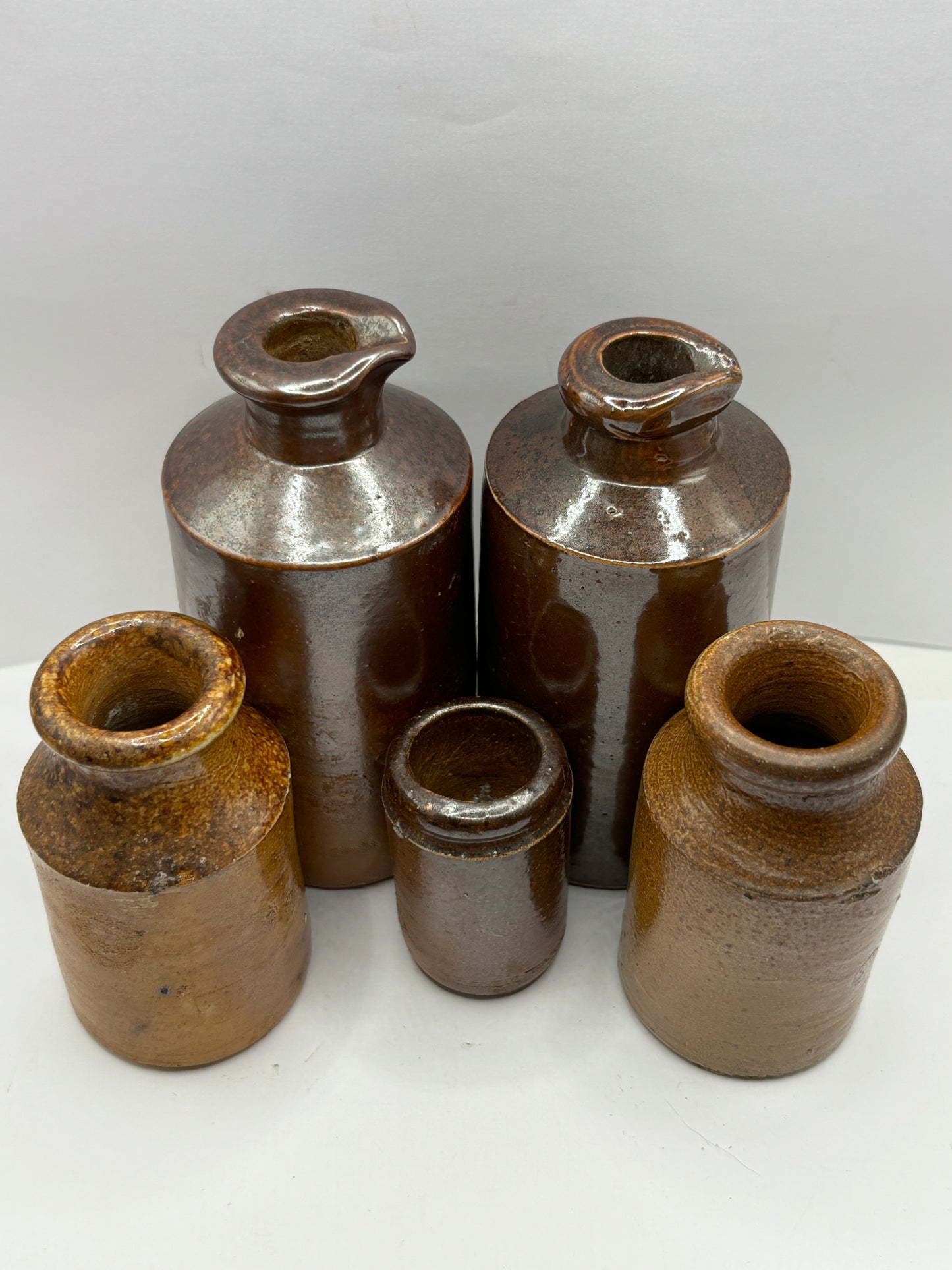 5 old brown stoneware pots