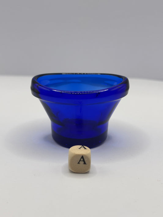 Old blue glass eye bath (a)