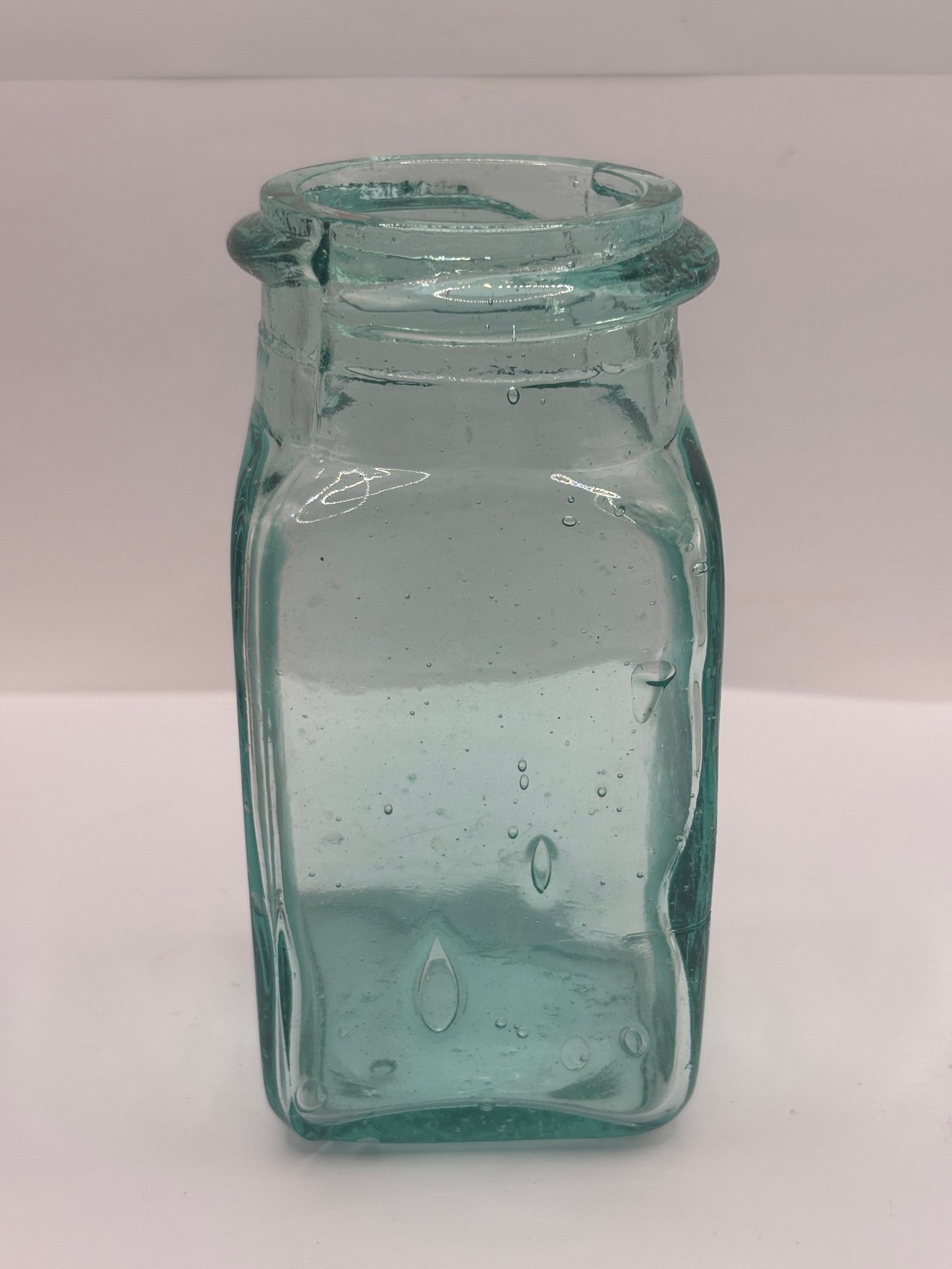 Old aqua glass pickle jar