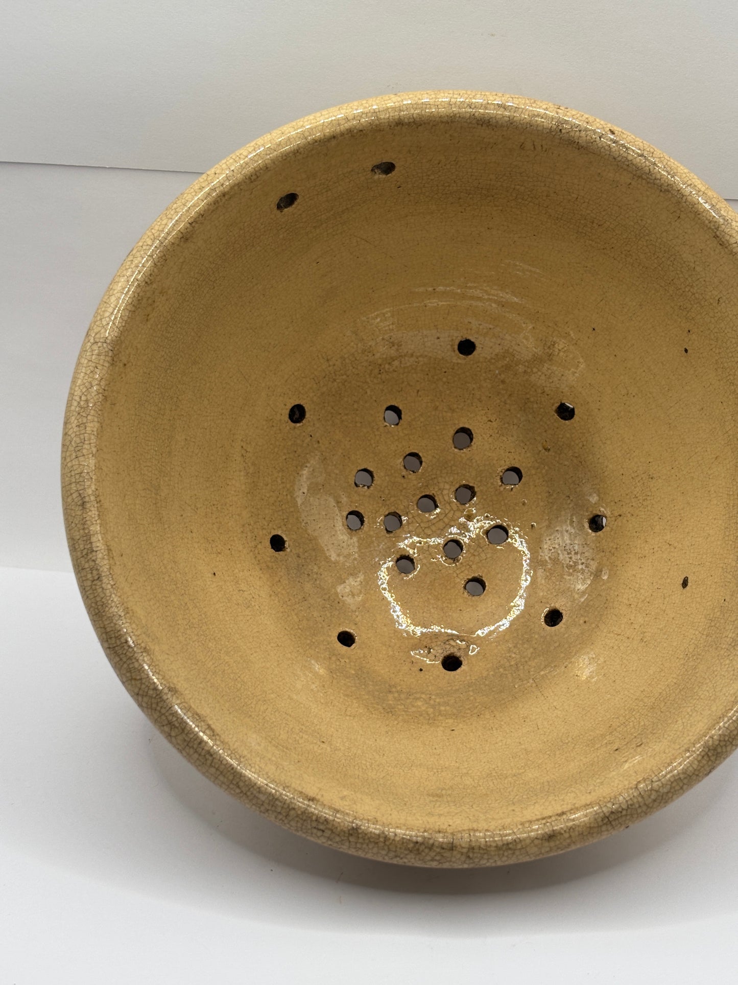 Old English stoneware strainer, crazed