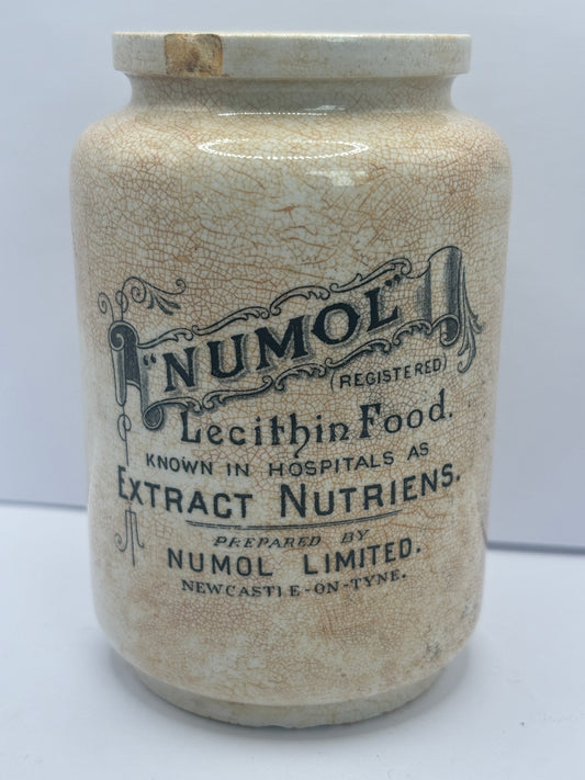 Early numol advertising jar