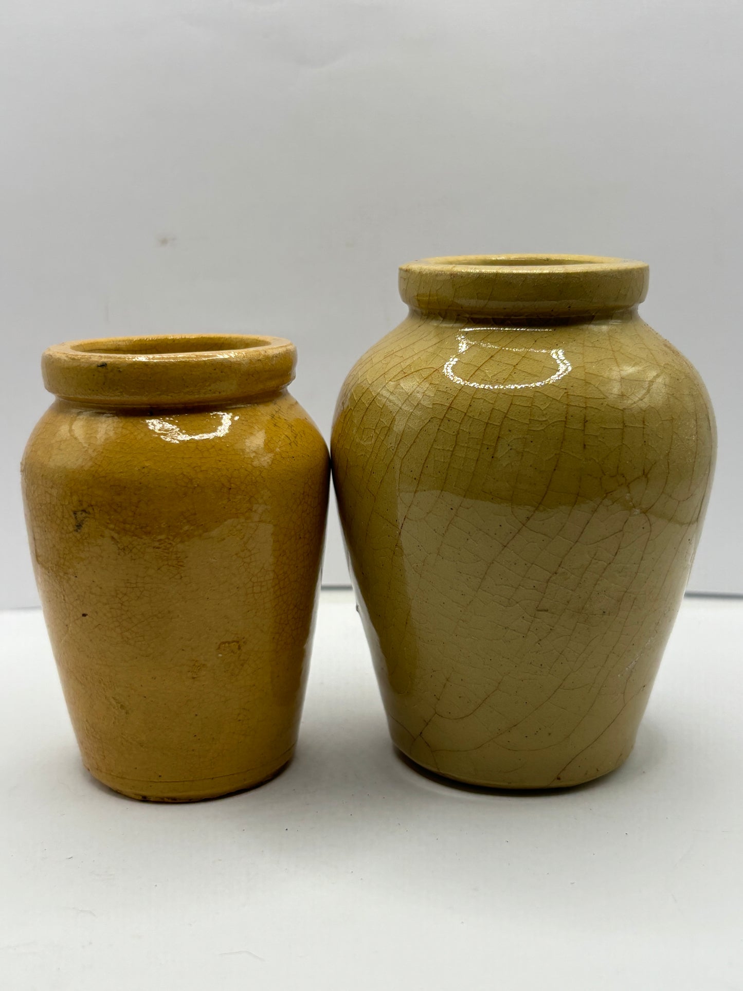 2 advertising cream pots, Stained & crazed