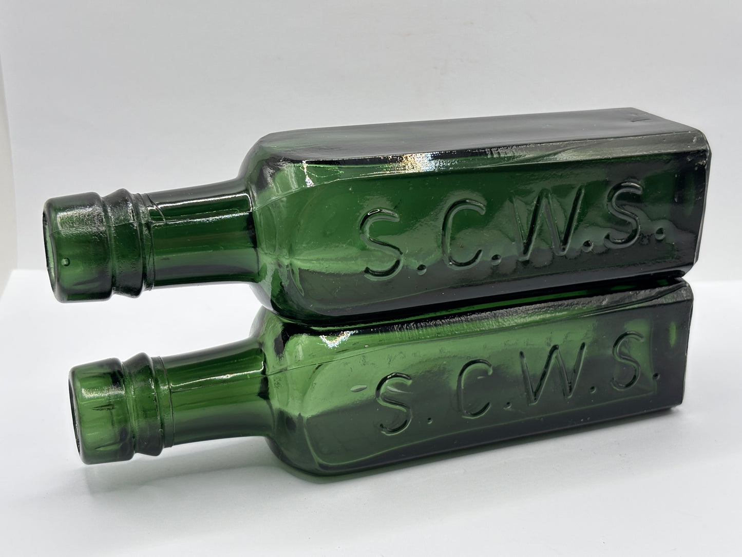 2 old green glass coffee essence bottles