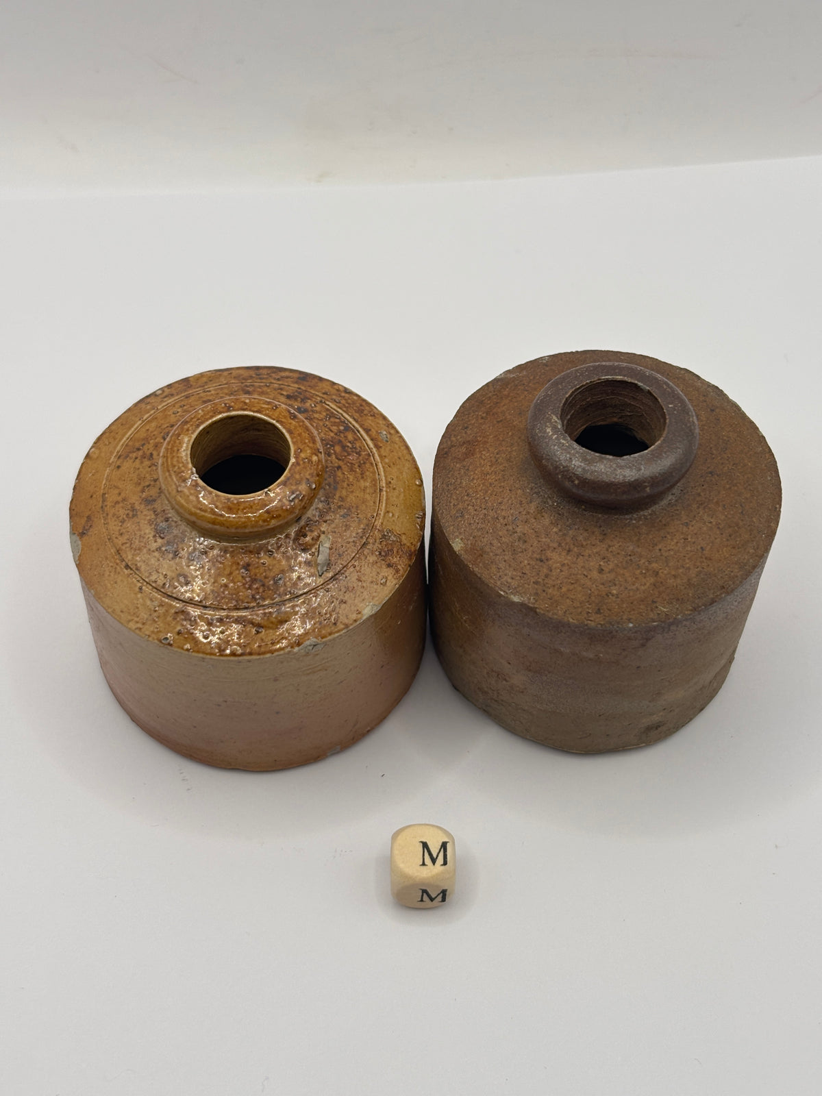 2 old brown stoneware ink bottles, inks. Pork pie ink (m)