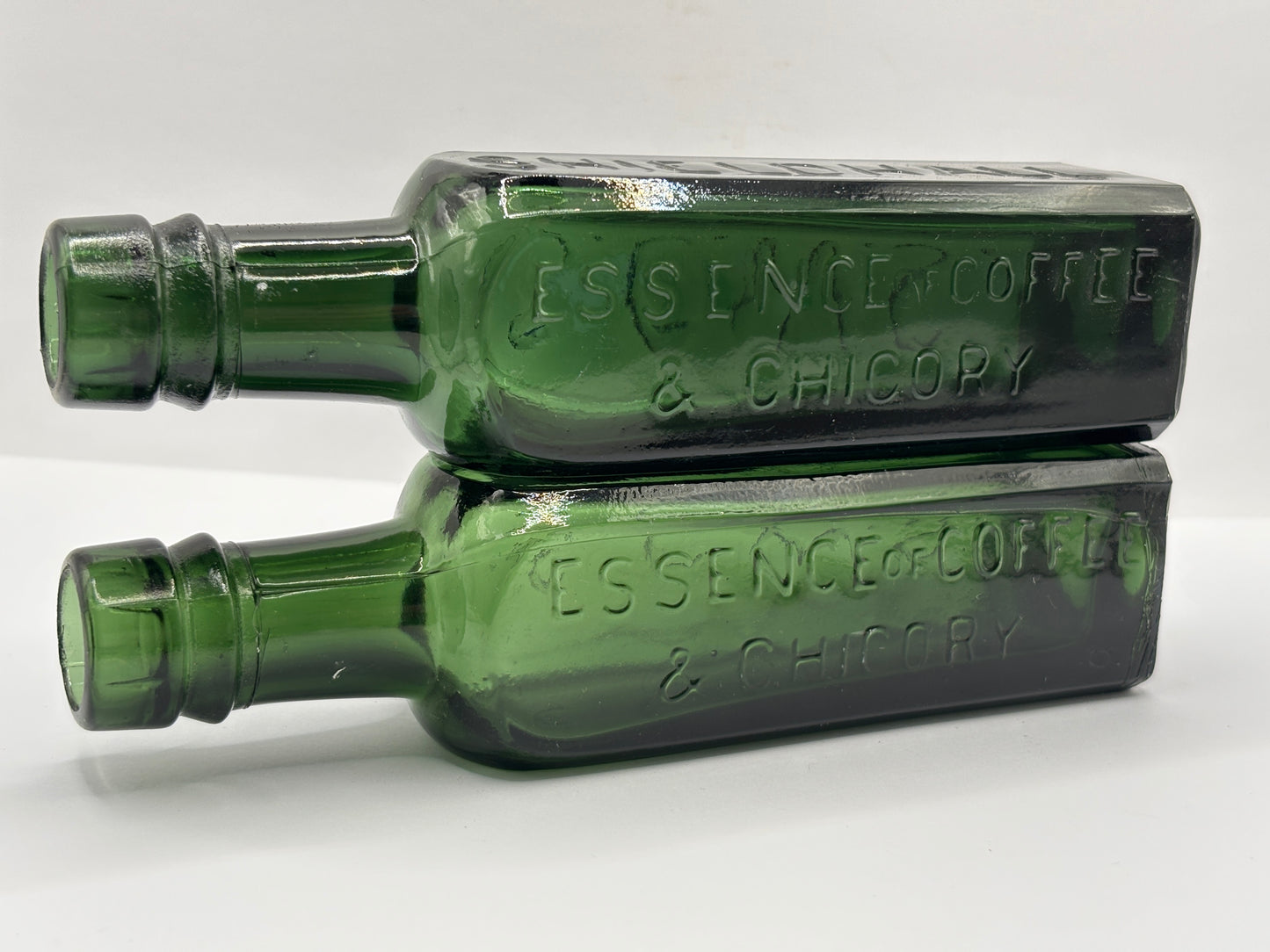 2 old green glass coffee essence bottles