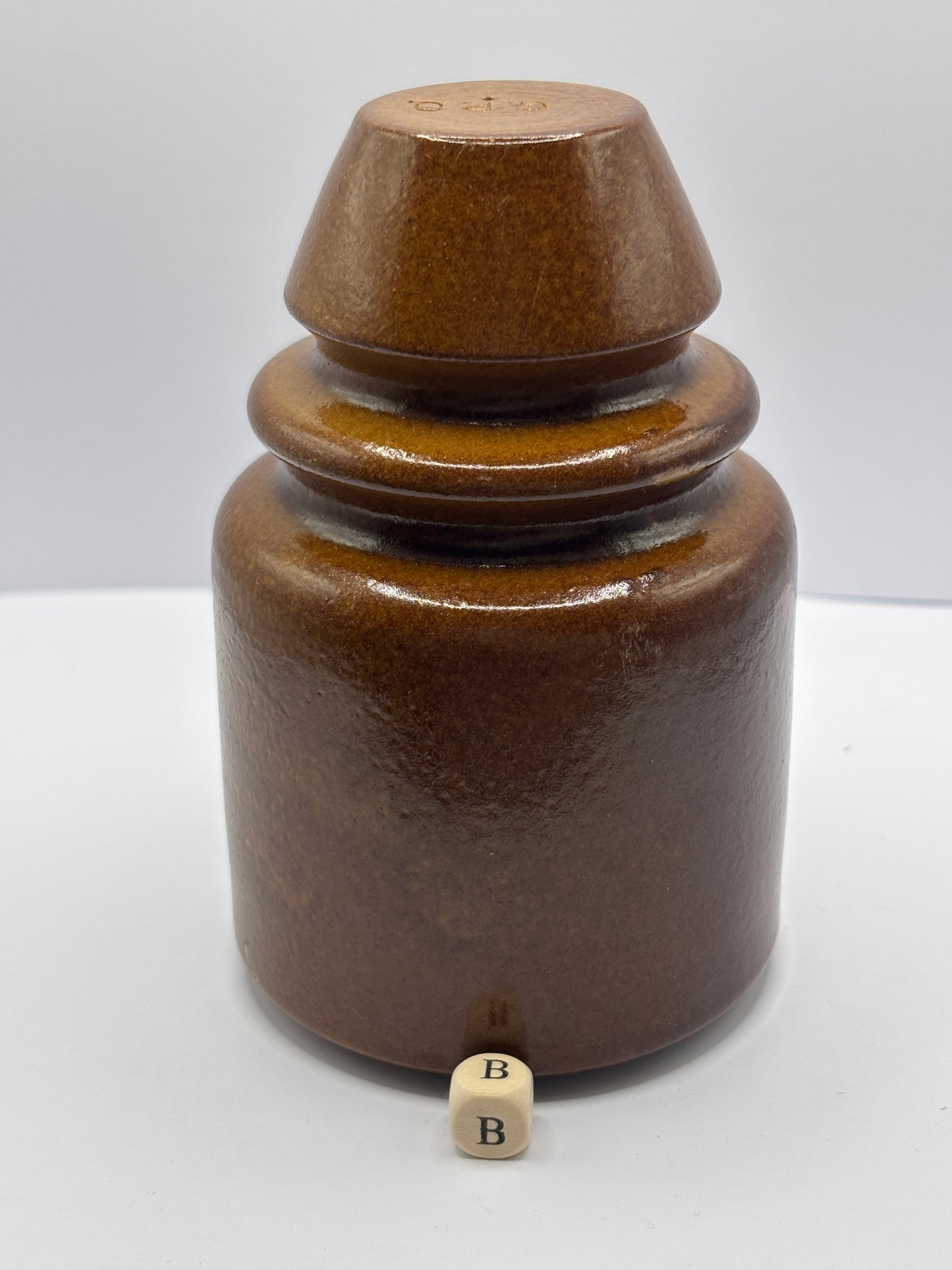Old stoneware telegraph pole insulator (B)