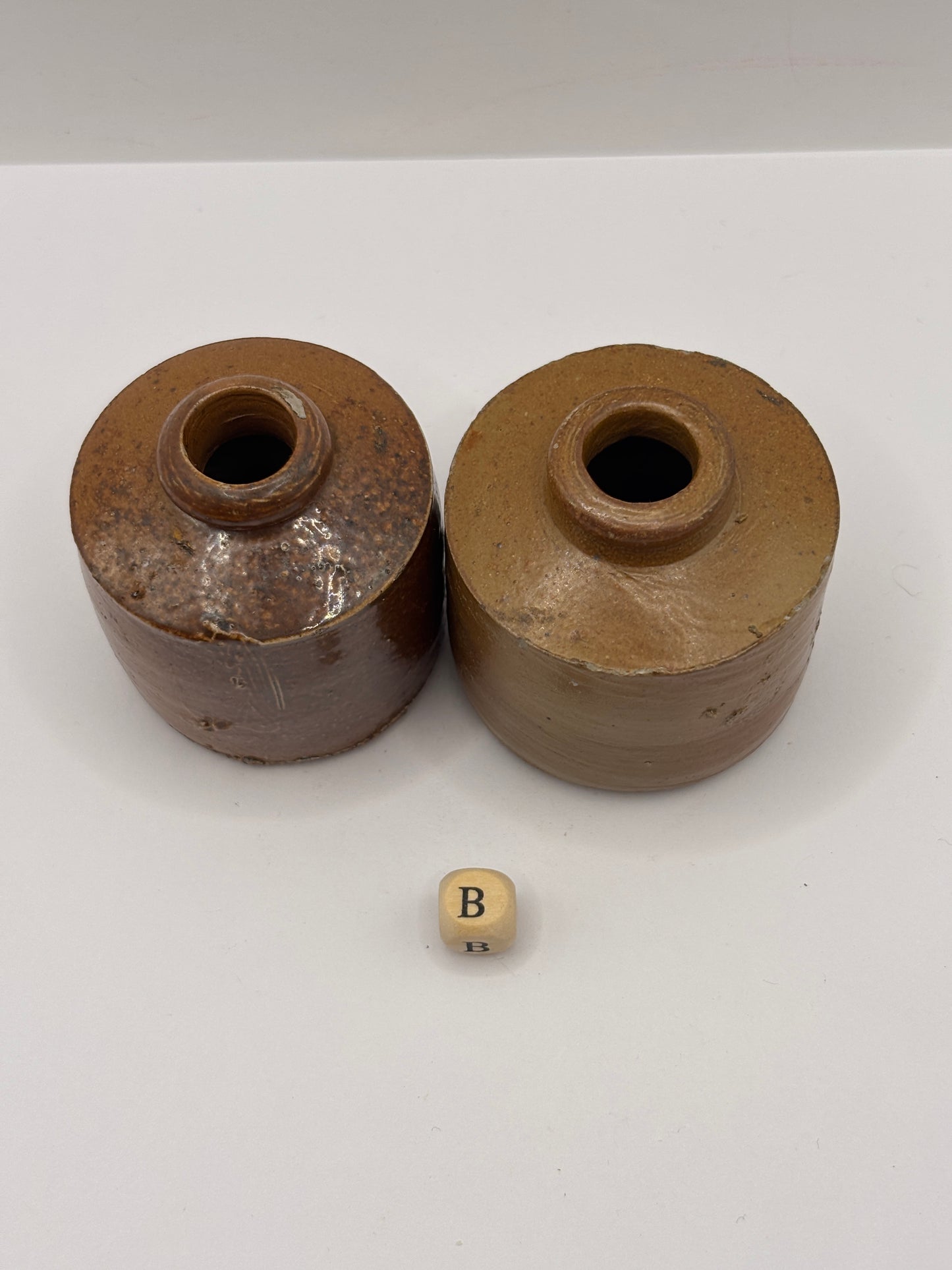 2 brown stoneware inkwells, ink bottles (B) pork pie inks